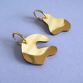 Boucles d'oreilles asymétriques