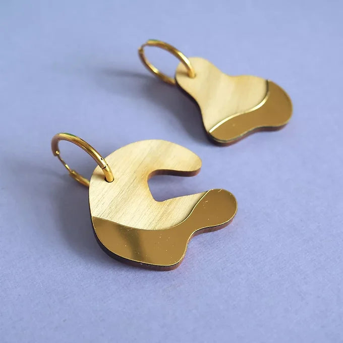 Boucles d'oreilles asymétriques