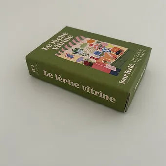 Puzzle 100 pièces - Le lèche vitrine